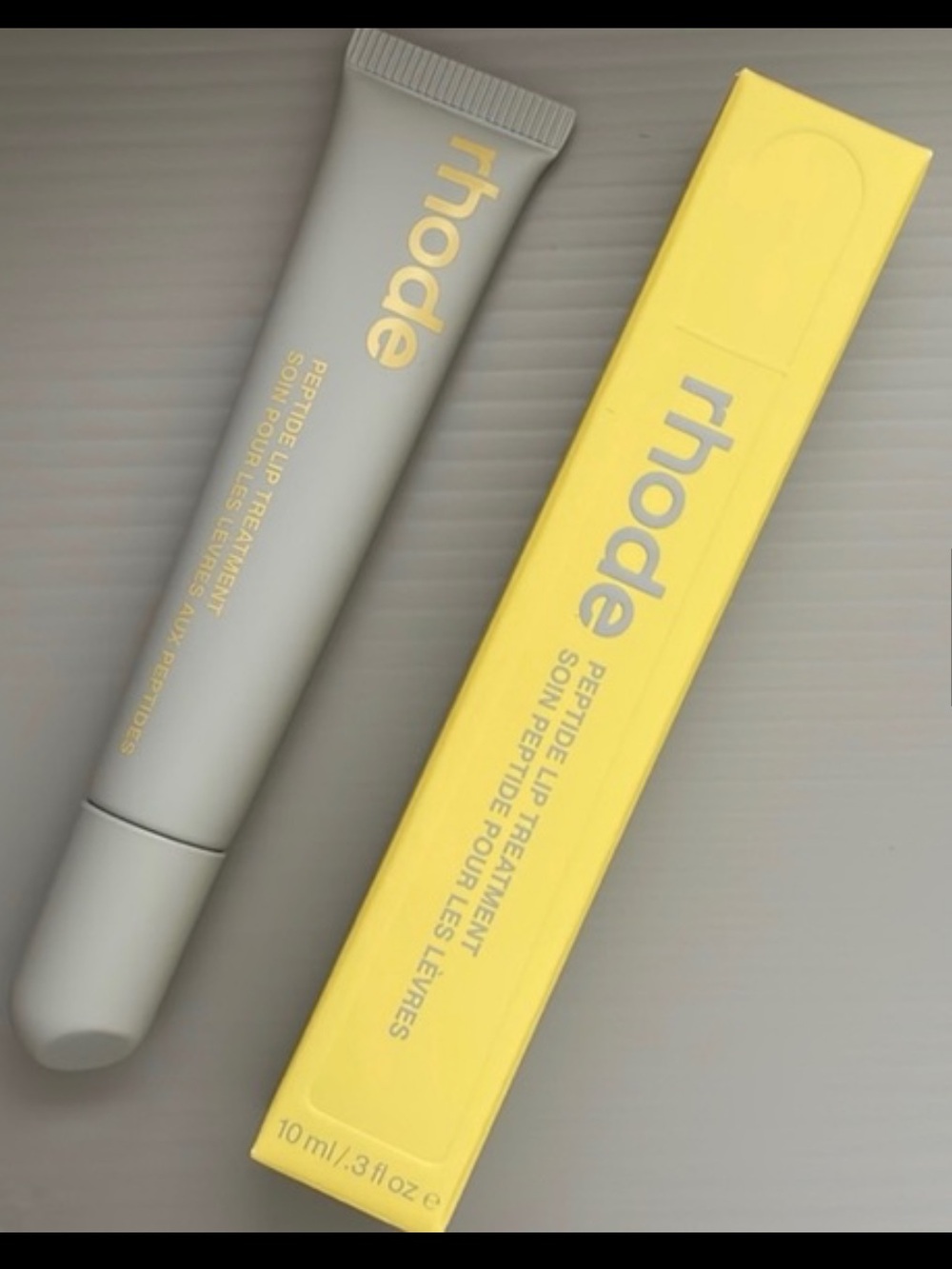 NWT Rhode Peptide Lip
Treatment // Passionfruit Jelly